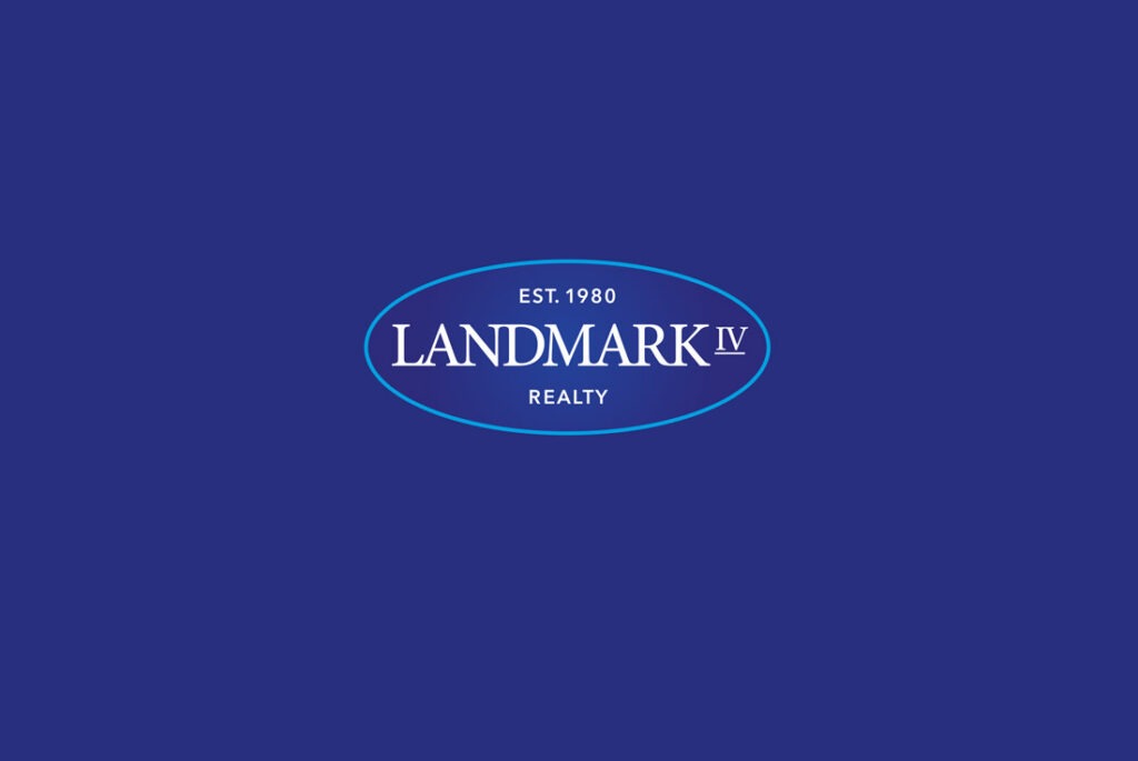 Landmark IV logo on blue background